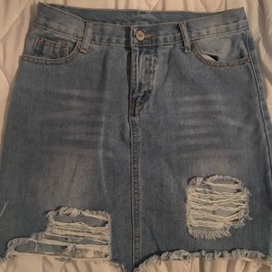 Jean shirt distressed at the bottom